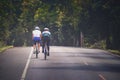 Couples of man riding touring bicycle on mountain road Royalty Free Stock Photo