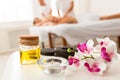 Couples Massage Spa Composition With Stones, Oil And Orchid Flowers Royalty Free Stock Photo