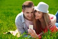 Couples with phone taking selfie self portrait at the park