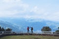 Couples traveling photography nature at sheep farm at Doi Pha Tang, Doi Inthanon National Park, Chom Thong, Chiang Mai, Thailand