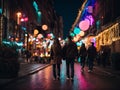 Couples walking hand in hand at night with bright lights