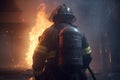 firefighter battles a blaze, using his hose to save a burning building