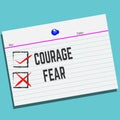 Courage or Fear on paper with creative design for your greetings card