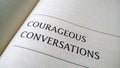 Courageous conversation printed on a book Royalty Free Stock Photo