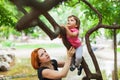 Courageous girl climbing on tree Royalty Free Stock Photo