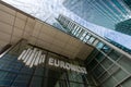 Sign and logo at the entrance to the Euronext building in the Paris La Defense business district