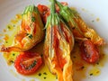 Courgette flowers stuffed with pizzottella and some tomato