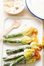 Courgette flowers stuffed with ricotta and coated in flour