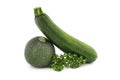 Courgette or zucchini and fresh parsley sprigs Royalty Free Stock Photo