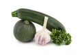 Courgette or zucchini, garlic knob and parsley Royalty Free Stock Photo