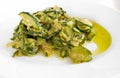 Courgettes cooked with olive oil and onions.