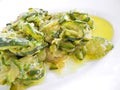 Courgettes cooked with olive oil and onions.