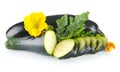 Courgettes cut into slices with flower and leaf on white Royalty Free Stock Photo