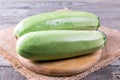 Courgettes zucchini on cutting board