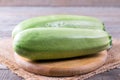 Courgettes zucchini on cutting board