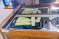 Courgettes zucchini are fried while sailing