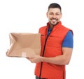 Courier with damaged cardboard box on background. Poor quality delivery service Royalty Free Stock Photo