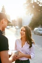 Courier Delivering Package To Woman. Client Receiving Box Royalty Free Stock Photo