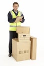 Courier Delivering Parcels Holding Clipboard