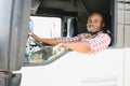 Courier Delivery. Black Man Driver Driving Delivery Car Royalty Free Stock Photo