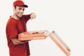 Smiling Arab Deliveryman with Opening Pizza Box.