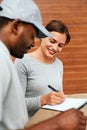 Courier Delivery Service. Man Delivering Package To Woman Royalty Free Stock Photo