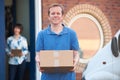 Courier Making Delivery To Client Office Royalty Free Stock Photo