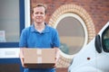 Courier Making Delivery To Office Royalty Free Stock Photo