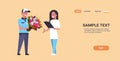 Courier man giving bouquet of flowers to woman recipient express delivery service concept girl receiving parcel from