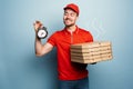 Courier is punctual to deliver quickly pizzas. Cyan background