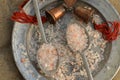 Course pink Himalayan salt on pewter plate and pewter spoons