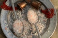 Course pink Himalayan salt on pewter plate and pewter spoons