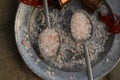 Course pink Himalayan salt on pewter plate and pewter spoons