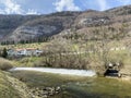 The course of the river Orbe between the cave or spring and the settlement of Vallorbe der Fluss Orbe or le fleuve de l`Orbe Royalty Free Stock Photo