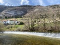 The course of the river Orbe between the cave or spring and the settlement of Vallorbe der Fluss Orbe or le fleuve de l`Orbe Royalty Free Stock Photo