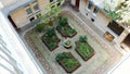 Court yard-well. A beautiful patio inside the old house in the form of a well. Interior of yard , The inner courtyard of Royalty Free Stock Photo