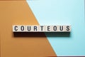 Courteous - word concept on cubes Royalty Free Stock Photo