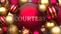 Courtesy and Xmas, pictured as red and golden, luxury Christmas ornament balls with word Courtesy to show the relation and