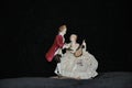 Musical statuettes from porcelain. Chevalier and the lady.