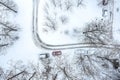 Courtyard of apartment building. parked cars covered with snow. aerial photo Royalty Free Stock Photo