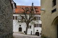 Courtyard with bare tree and fountain the castle Hellenstein on the hill of Heidenheim an der Brenz in southern Germany against a Royalty Free Stock Photo