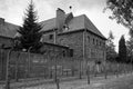 Courtyard between barracks of the Auschwitz concentration camp black and white photo: Auschwitz / Poland - October 19, 2020