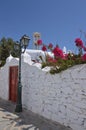 Courtyard, Bell Tower & Door Of Panagia Tourliani Monastery In Ano Mera On The Island Of Mykonos. Architecture Landscapes Travels