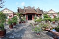 Courtyard with bonsai of the Assembly Hall Of Fujian Chinese Temple in Hoi An Royalty Free Stock Photo