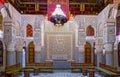 Courtyard decorated with mosaic and carvings in a Moroccan riad