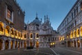 Courtyard of the Doge\'s Palace (Palazzo Ducale) in Venice. San Marco basilica in background Royalty Free Stock Photo