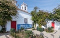 LISBOA, PORTUGAL. Courtyard with flowers of the Church of the order of Malta in Sunny weather Royalty Free Stock Photo