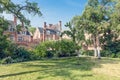 Courtyard garden with old historic houses of beguinage at Antwerp, Belgium Royalty Free Stock Photo