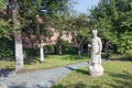 Courtyard garden with statue and old historic houses of beguinage in Antwerp, Belgium Royalty Free Stock Photo