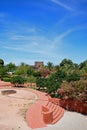 Courtyard gardens with castle tower to the rear, Silves, Portugal. Royalty Free Stock Photo